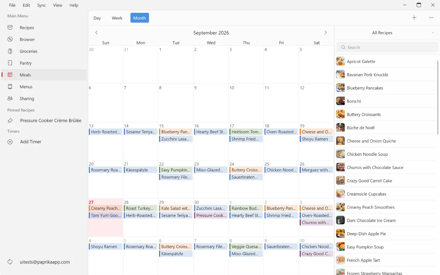 The Meals screen on Windows: the month view in the middle with today highlighted, the Day, Week and Month switch above it, the add and actions buttons in the upper right, and the recipes sidebar on the right.